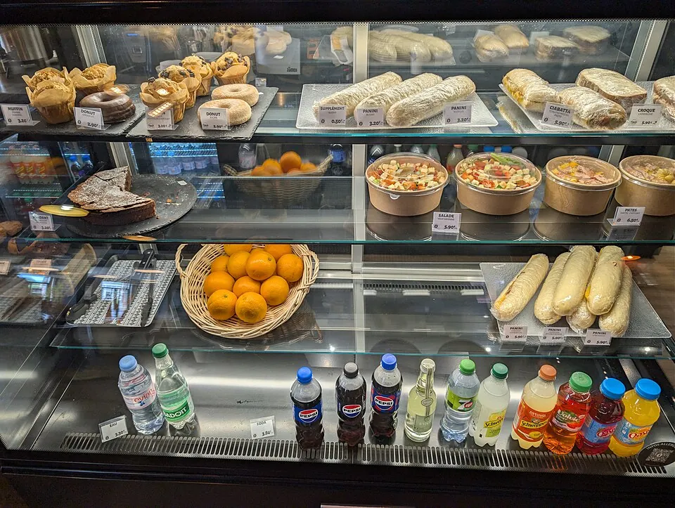 food display case at the counter of French Coffee Shop, Dieppe