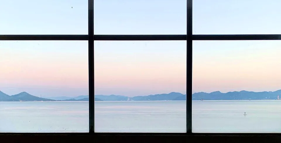 Bedroom window view of Seto Inland Sea in morning, Onomichi, Ikuchi Island, Japan