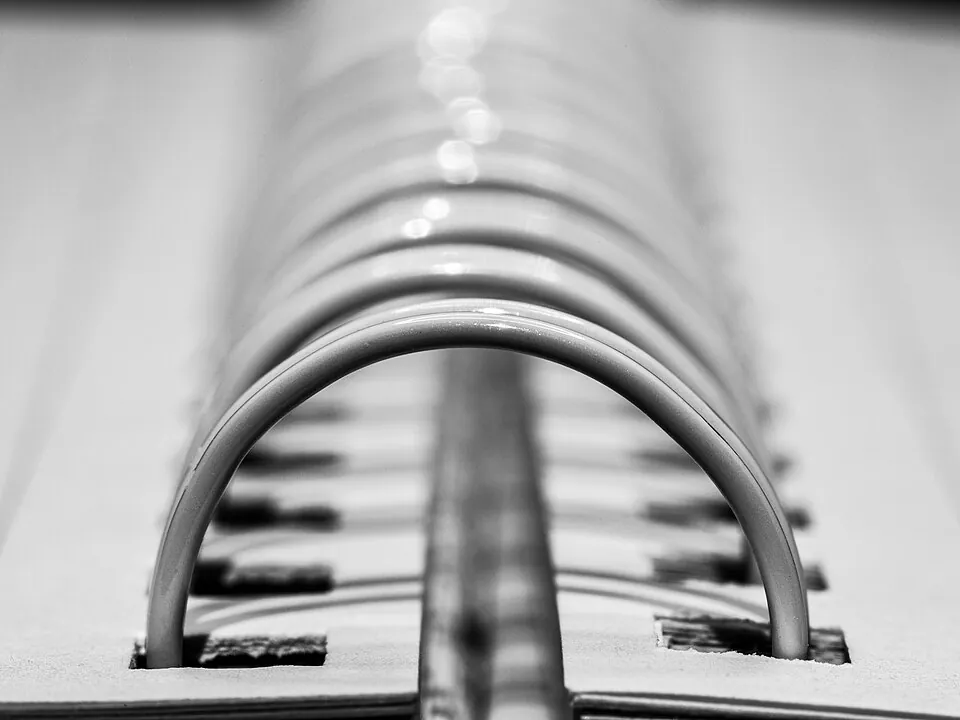 Close-up of a spiral binding comb of a notebook
